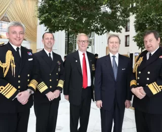 Secretary William Cohen hosts UK First Sea Lord Admiral Sir Philip Jones, UK Second Sea Lord Vice Admiral Jonathan Woodcock, US Chief of Naval Operations John Richardson, and the National President of the US Navy League, Mr. Skip Witunski, at the Navy League Sea-Air-Space Exposition.