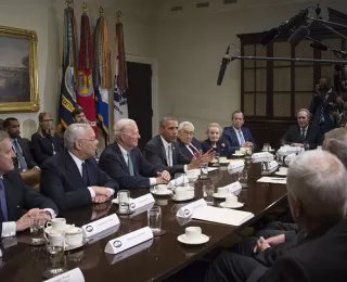 Secretary William Cohen attends a meeting on the Trans-Pacific Partnership Agreement with President Barack Obama and other former cabinet officials.